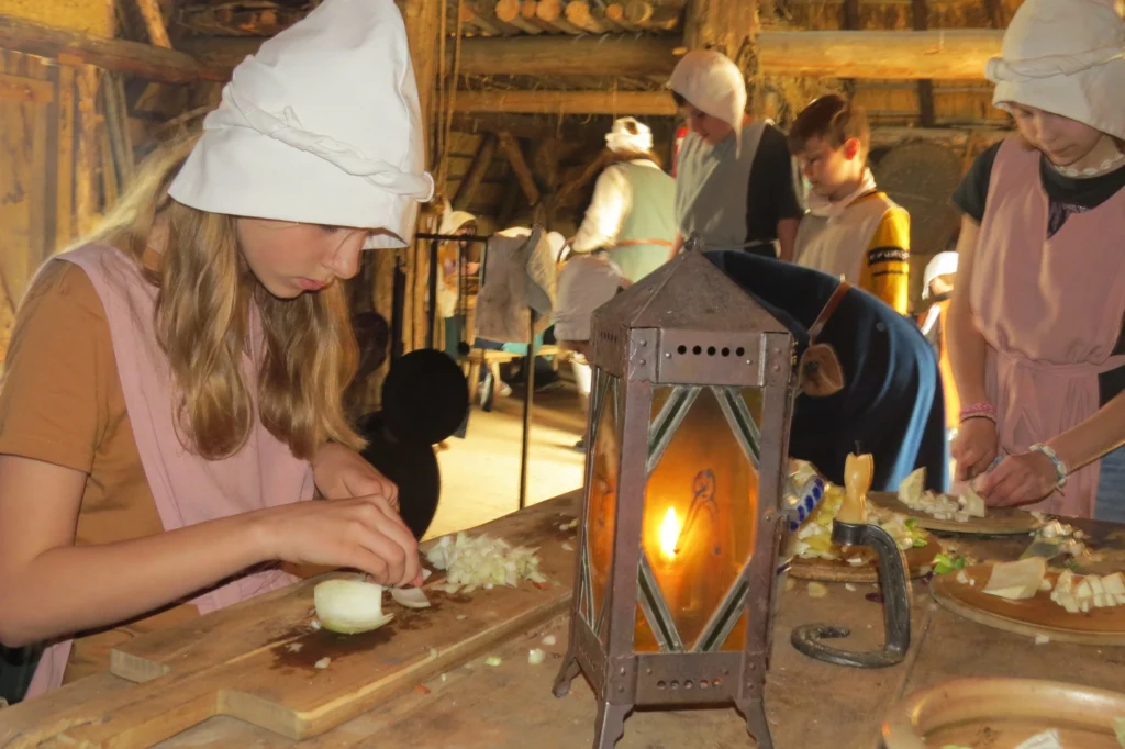 Kinderen koken in de middeleeuwen